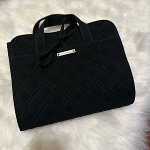 Vera Bradley hanging organizer. All zippers functional. Slight makeup stain